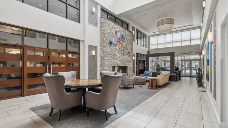 Bright and inviting common area, featuring comfortable seating and vibrant decor, fostering community spirit.