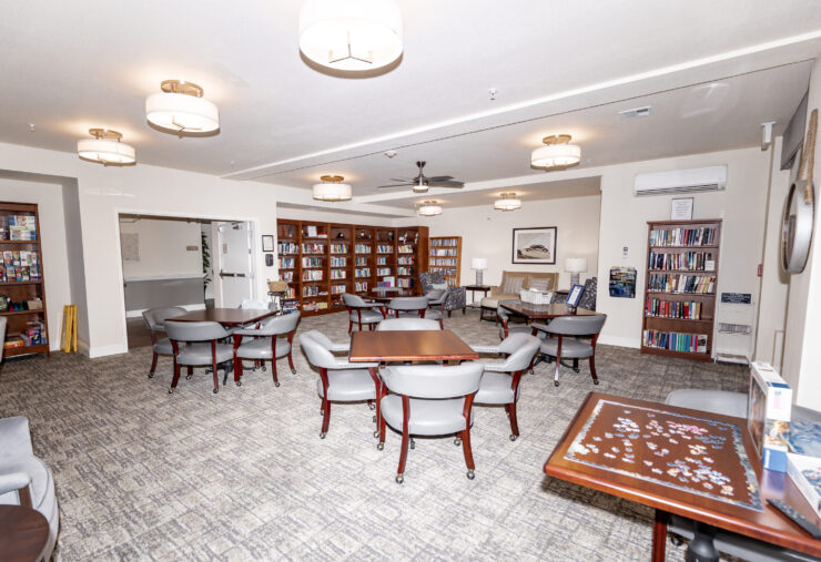 A warm, inviting space filled with comfortable seating, perfect for community gatherings and relaxation.