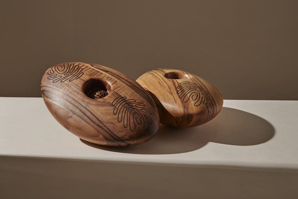 Elegant wooden sculptures create a warm, inviting atmosphere, perfect for community gatherings.