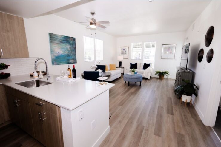 Bright, inviting living space with comfortable seating, perfect for community gatherings and relaxation.
