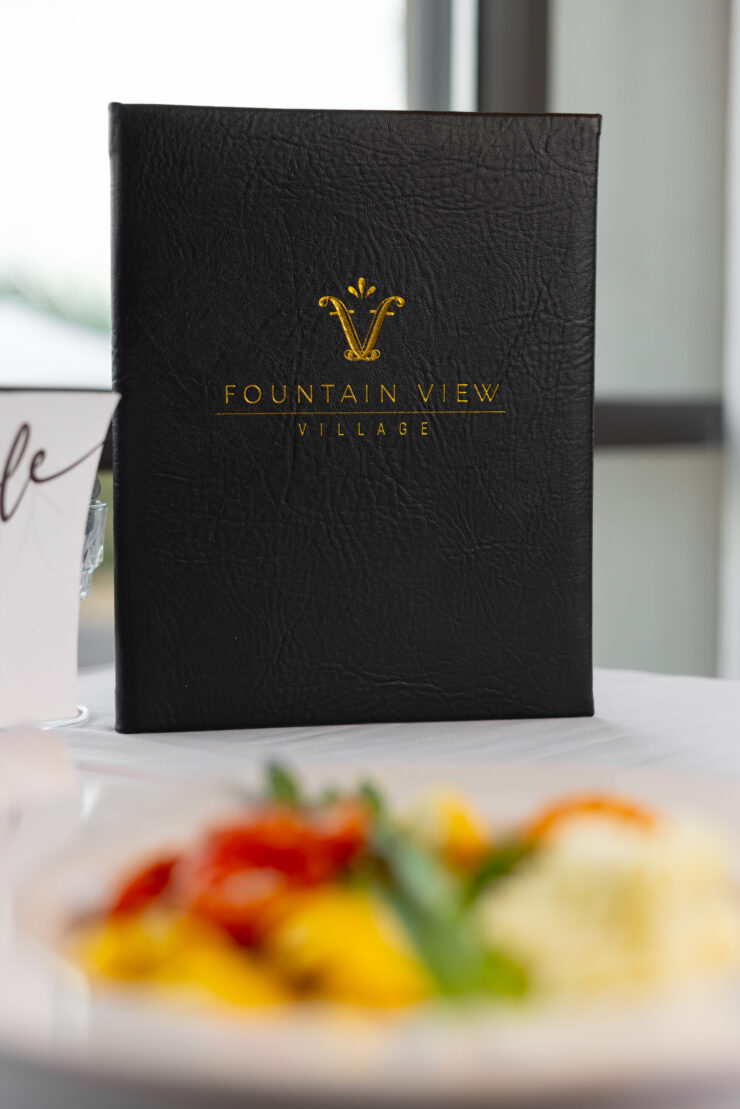 A welcoming dining setting featuring a stylish menu, inviting delicious meals, and a sense of community.