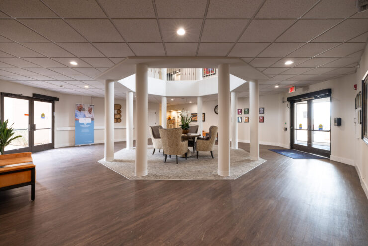 A welcoming lobby with comfortable seating invites residents and visitors to connect and relax.