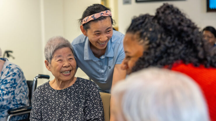 Lively interactions among residents and staff create a warm, welcoming community atmosphere.