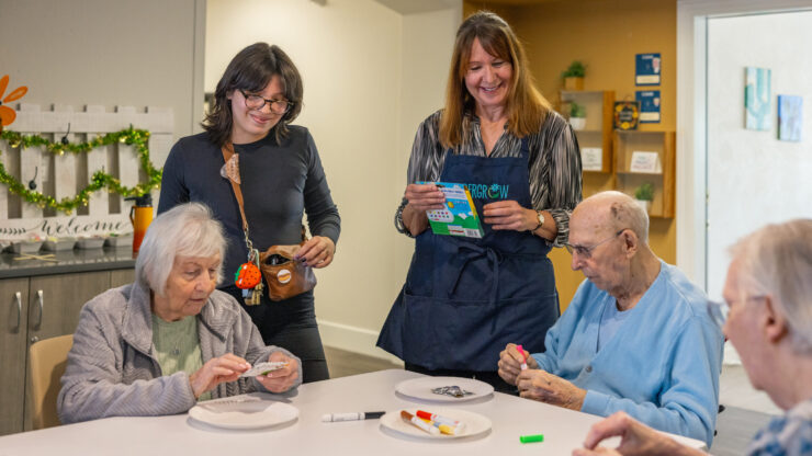 Engaging activities foster connection and joy among residents in a warm, welcoming environment.