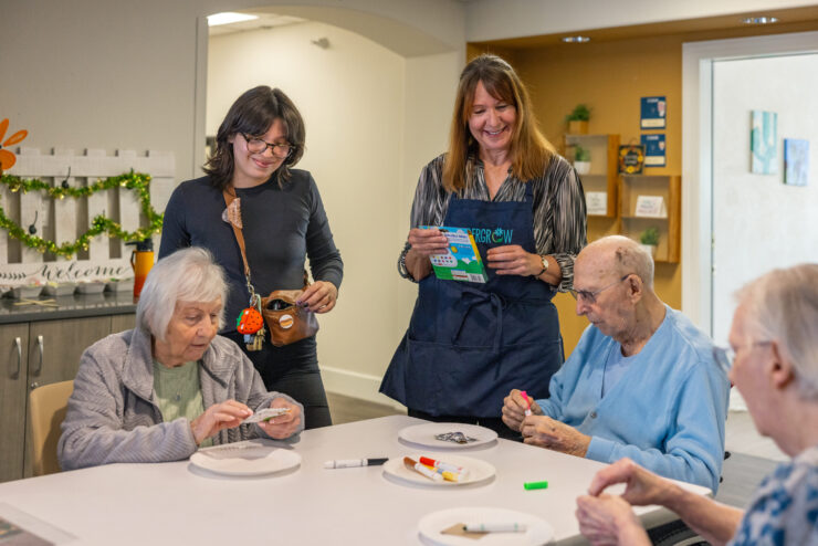 Engaging activities foster connection and joy among residents in a warm, welcoming environment.