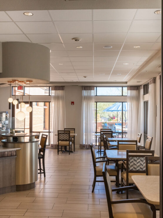 A bright, welcoming space with comfortable seating and natural light, perfect for community gatherings.