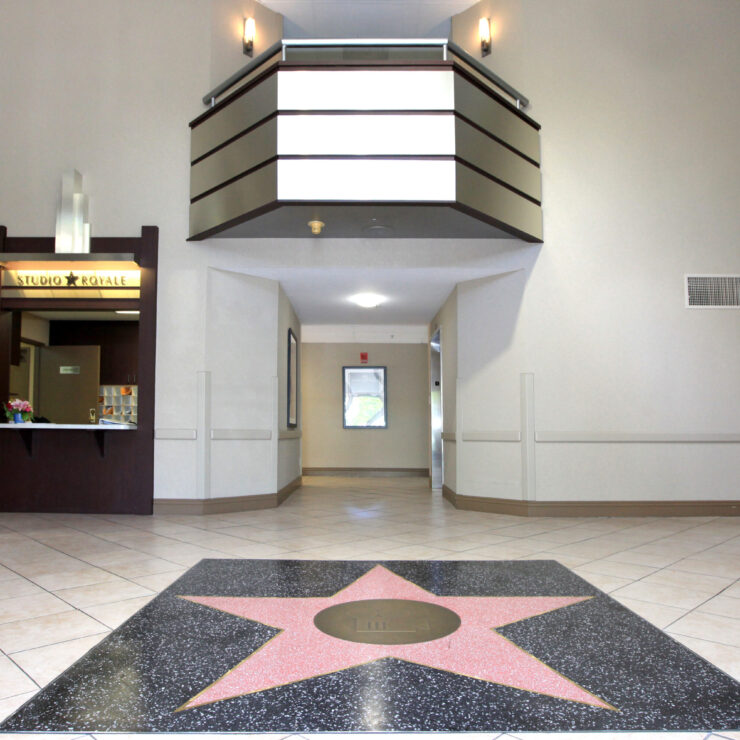 Welcoming space featuring a vibrant lobby with a star motif, fostering community and warmth.