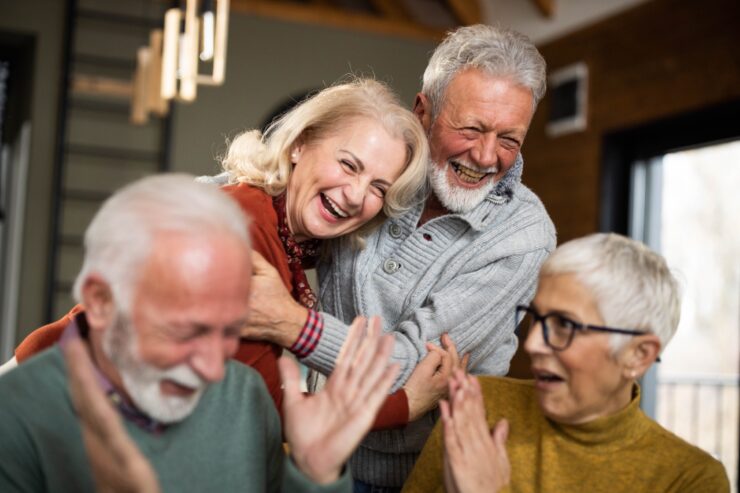 Laughter and joy fill the room as friends share a heartfelt moment, celebrating community and connection.