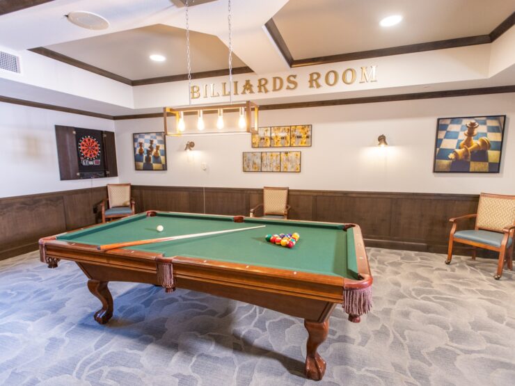 A welcoming billiards room, perfect for socializing and enjoying friendly games in a vibrant community.