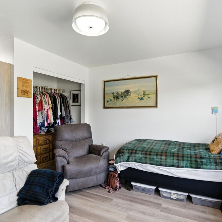 A welcoming room featuring comfortable seating and personal touches, perfect for relaxation and connection.