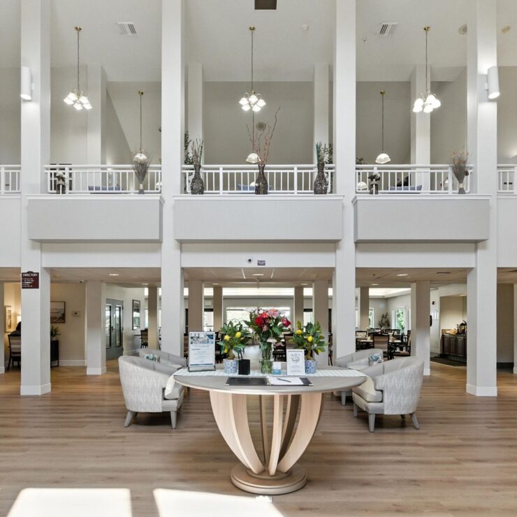 Bright, welcoming lobby with elegant decor, inviting seating, and a sense of community and warmth.