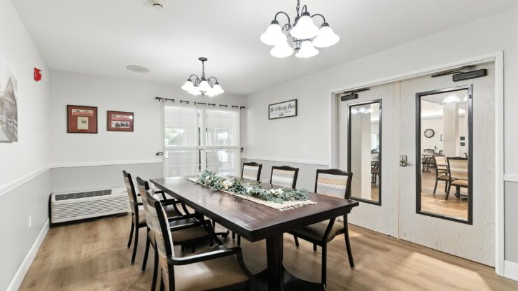 A welcoming dining area with a large table, perfect for community gatherings and shared meals.
