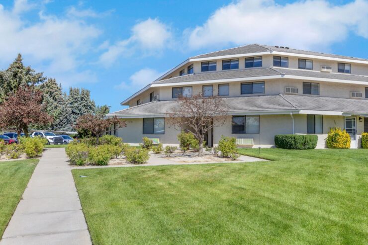 A welcoming residence surrounded by lush greenery, perfect for fostering community and comfort.