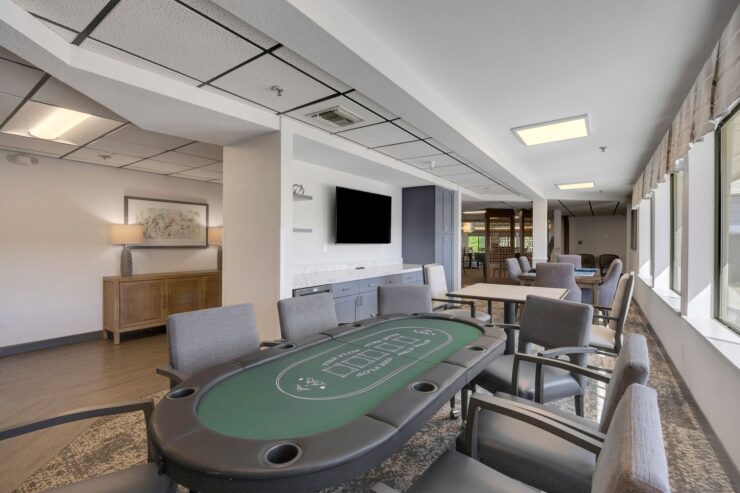 A welcoming game room with comfortable seating, perfect for socializing and enjoying friendly competition.