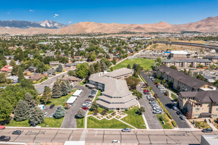 A vibrant community surrounded by scenic mountains, offering a welcoming and serene atmosphere.