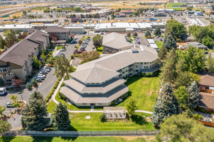 A welcoming community nestled in lush greenery, designed for comfort and connection.