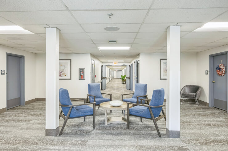 Welcoming seating area promotes connection and comfort, inviting residents to enjoy community moments.