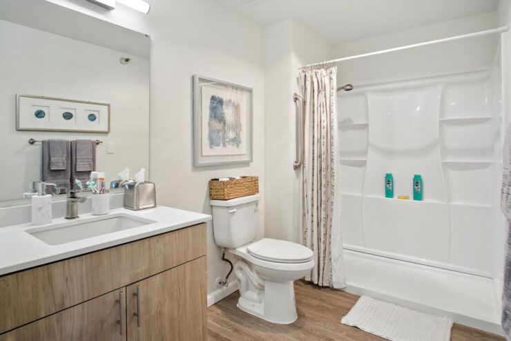 A bright and inviting bathroom, showcasing modern amenities and thoughtful design for comfort.