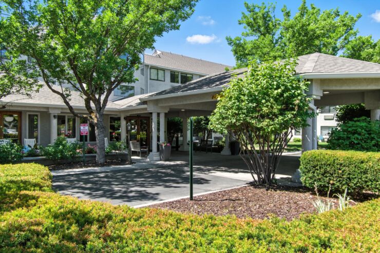 A welcoming retreat surrounded by lush greenery, inviting residents to enjoy a vibrant community.