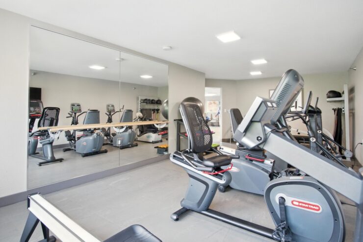 A bright, welcoming fitness center filled with modern equipment, promoting health and community.