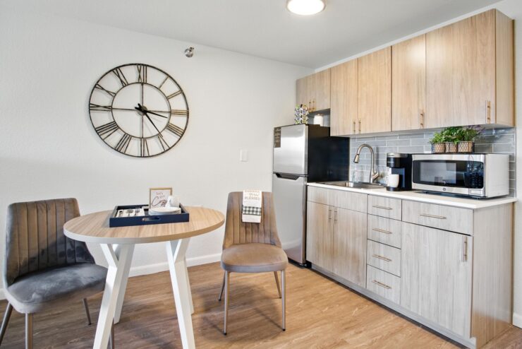 A welcoming kitchen space featuring modern amenities, perfect for community gatherings and meals.