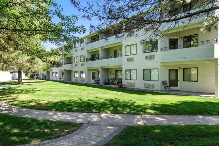 A welcoming community space with lush greenery, ideal for relaxation and joyful gatherings.