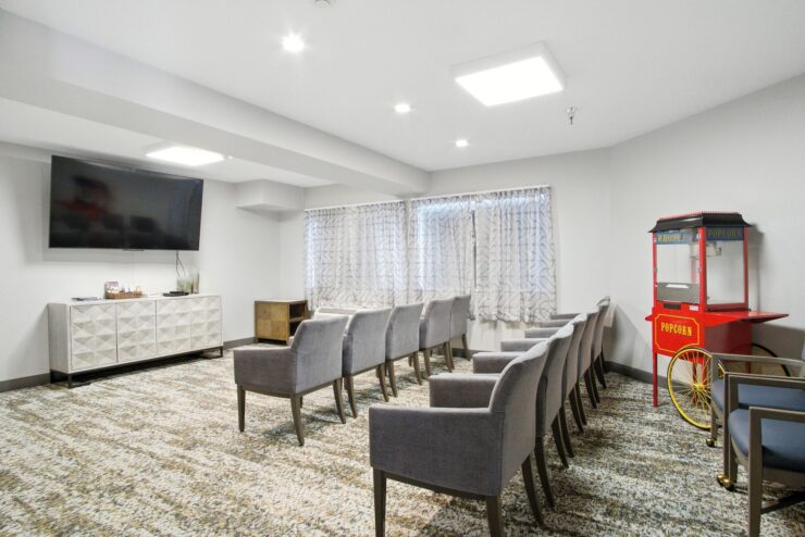 A welcoming gathering space with comfortable seating, promoting community and connection among residents.