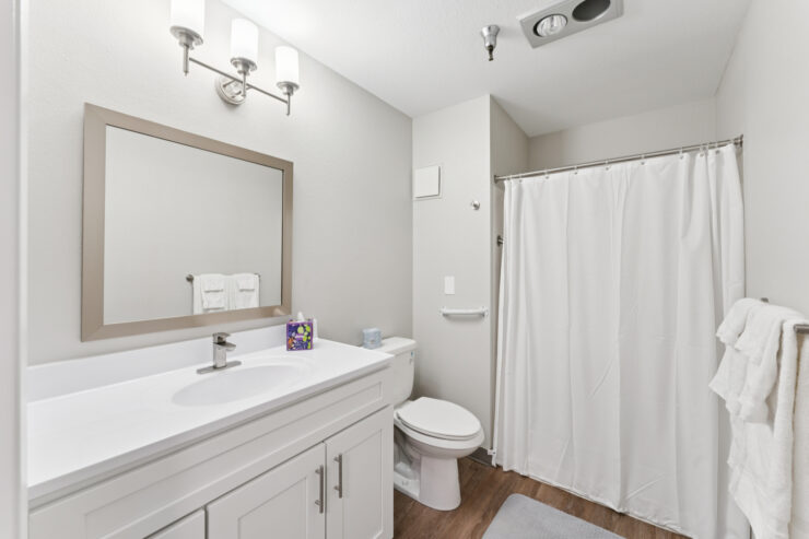 A bright, welcoming bathroom featuring modern amenities, ensuring comfort and accessibility for residents.