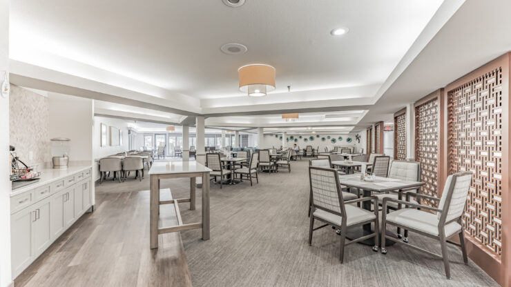 A bright, welcoming dining area fosters community and comfort, inviting residents to gather and connect.