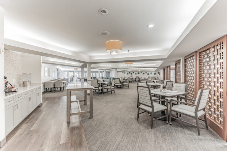 A bright, welcoming dining area fosters community and comfort, inviting residents to gather and connect.