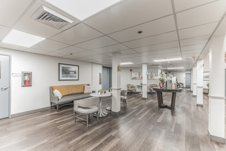 A welcoming space designed for community gatherings, featuring comfortable seating and warm decor.