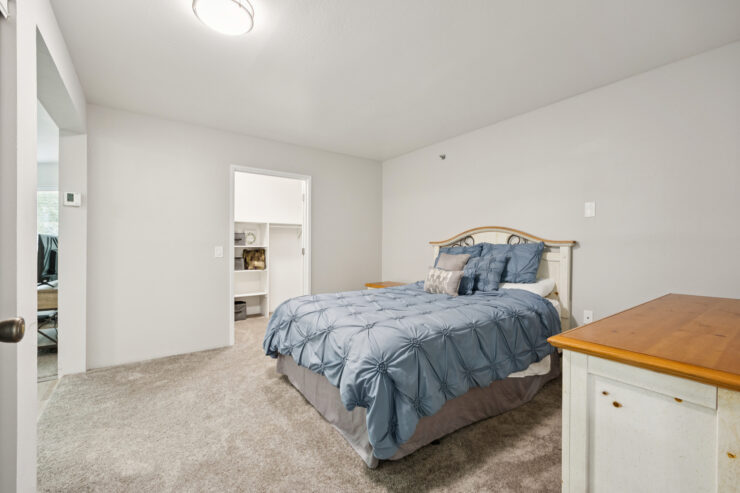 A welcoming bedroom featuring soft colors and inviting decor, perfect for relaxation and comfort.