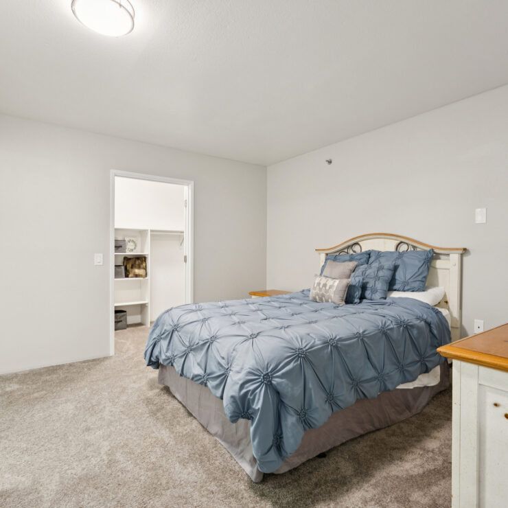A welcoming bedroom featuring soft colors and inviting decor, perfect for relaxation and comfort.