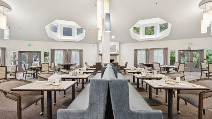 Bright and inviting dining area, fostering community and comfort with ample natural light and cozy seating.