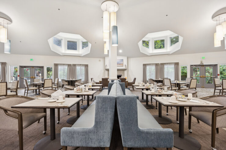 Bright and inviting dining area, fostering community and comfort with ample natural light and cozy seating.