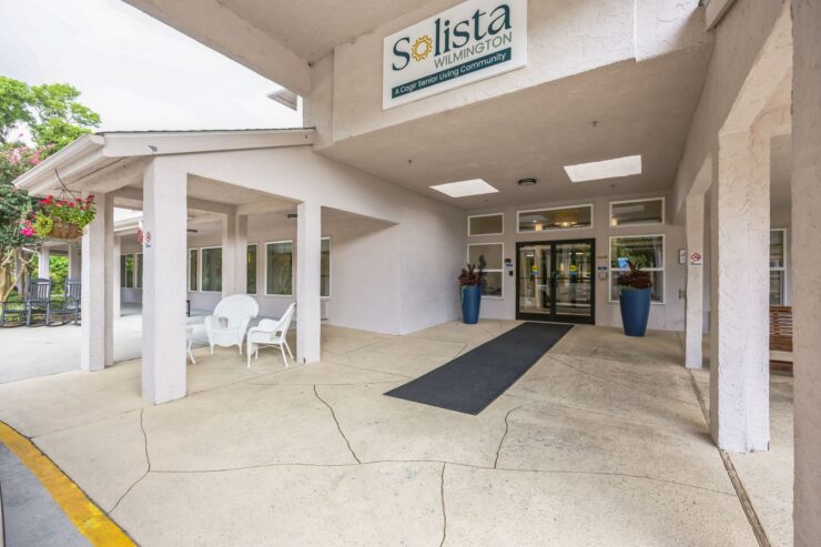 Welcoming entrance with bright decor, inviting seating, and a sense of community and comfort.