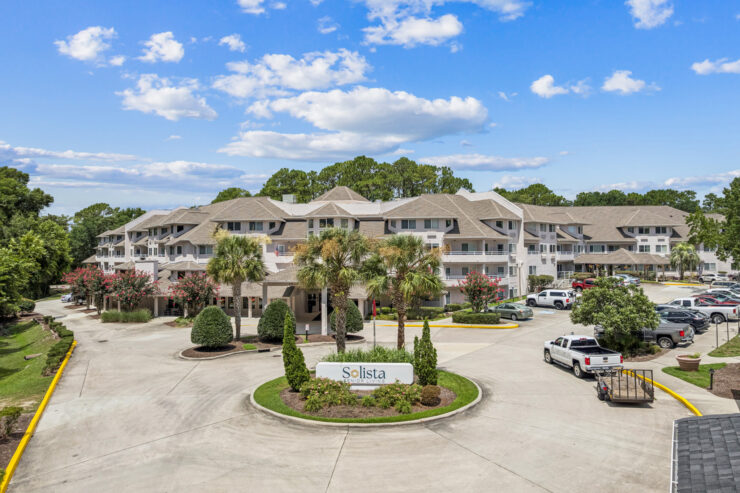 A welcoming community surrounded by lush greenery, perfect for relaxation and connection.