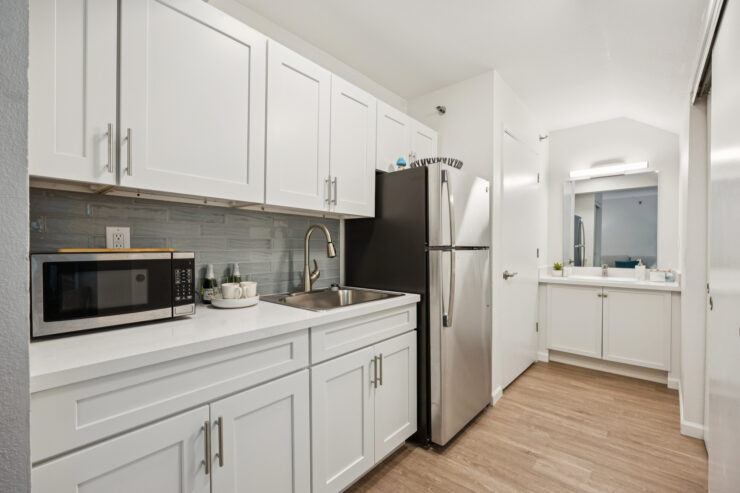 A bright kitchen space, inviting and modern, perfect for community gatherings and shared meals.