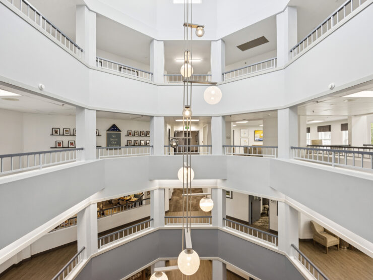 A vibrant, welcoming space featuring elegant architecture and communal areas for connection and relaxation.