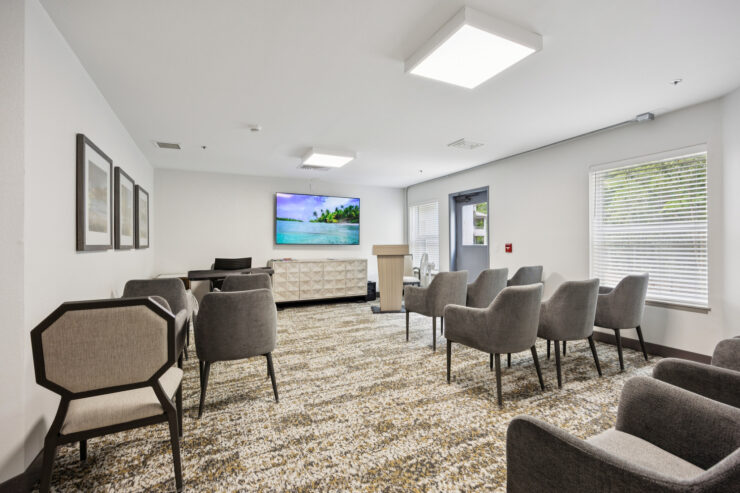 A welcoming lounge with comfortable seating, perfect for community gatherings and relaxation.