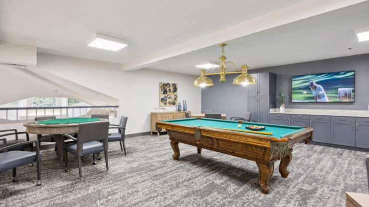 A vibrant game room inviting residents to enjoy leisure activities and foster community connections.