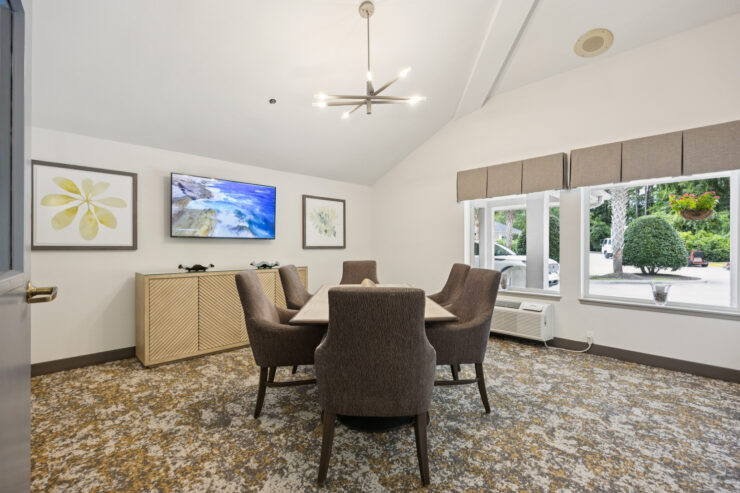 A bright, inviting meeting space with comfortable seating, fostering community and connection.