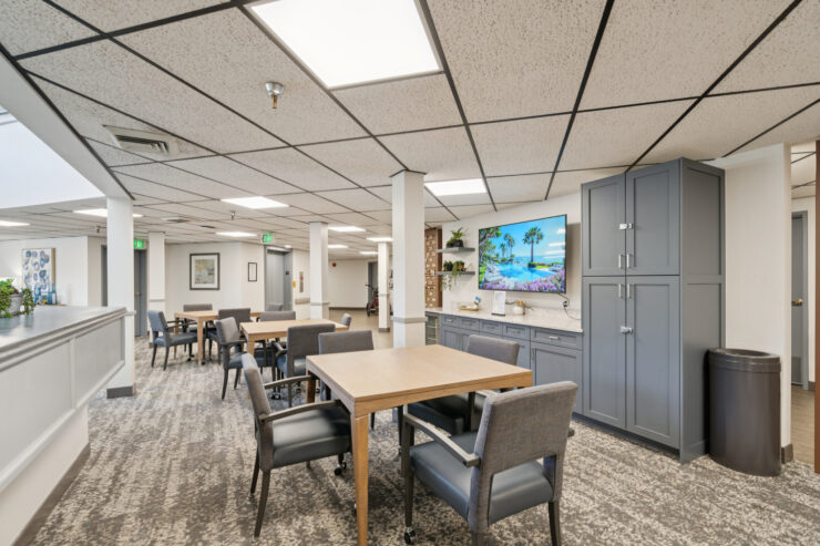 A welcoming communal space, featuring comfortable seating and vibrant decor, perfect for gatherings.