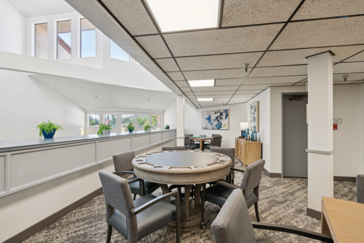 Bright and inviting common area with comfortable seating, perfect for community gatherings and relaxation.