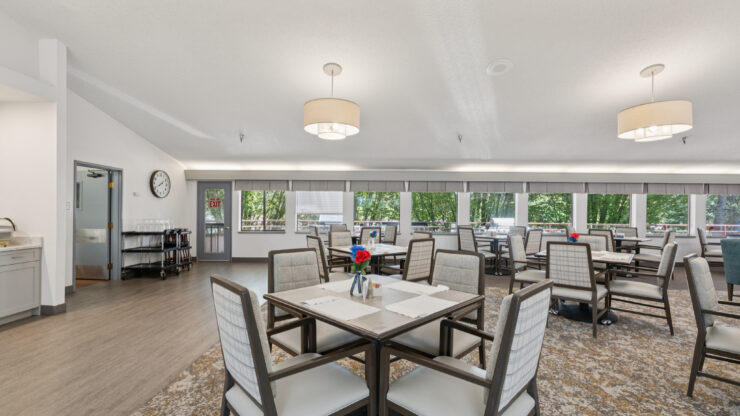 Bright and inviting dining area fostering community and connection among residents.