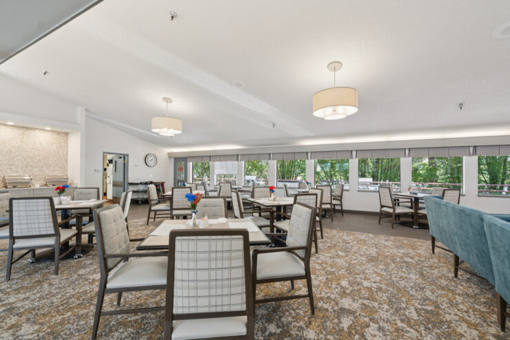 A welcoming dining area with bright natural light, inviting tables, and a sense of community.