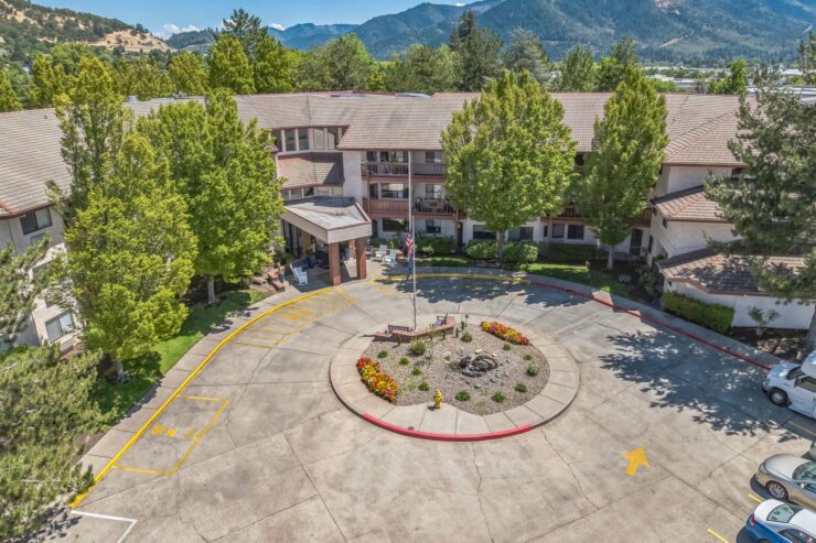 A welcoming retirement community surrounded by nature, fostering connection and relaxation.