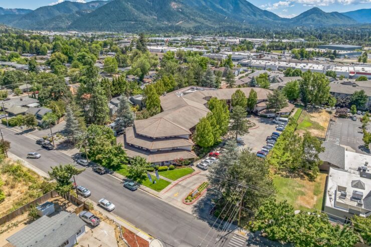 Nestled near serene mountains, this welcoming community features lush greenery and ample parking.