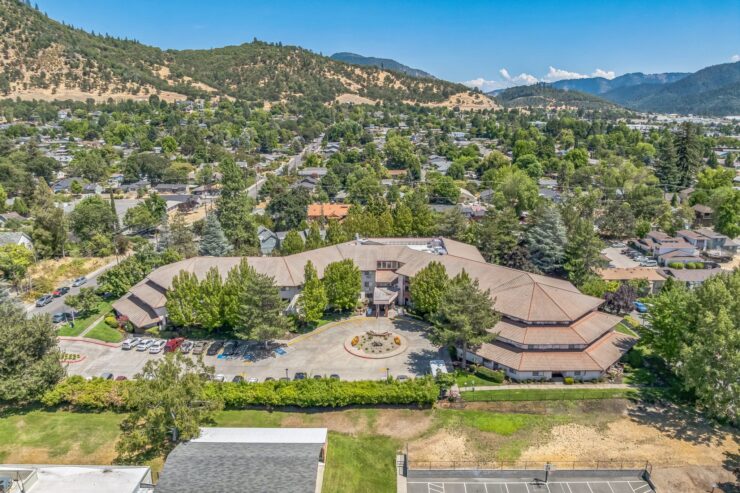 Nestled among lush greenery and mountains, this welcoming community fosters comfort and connection.