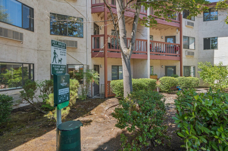 A welcoming outdoor space with well-maintained greenery, inviting residents to enjoy community life.